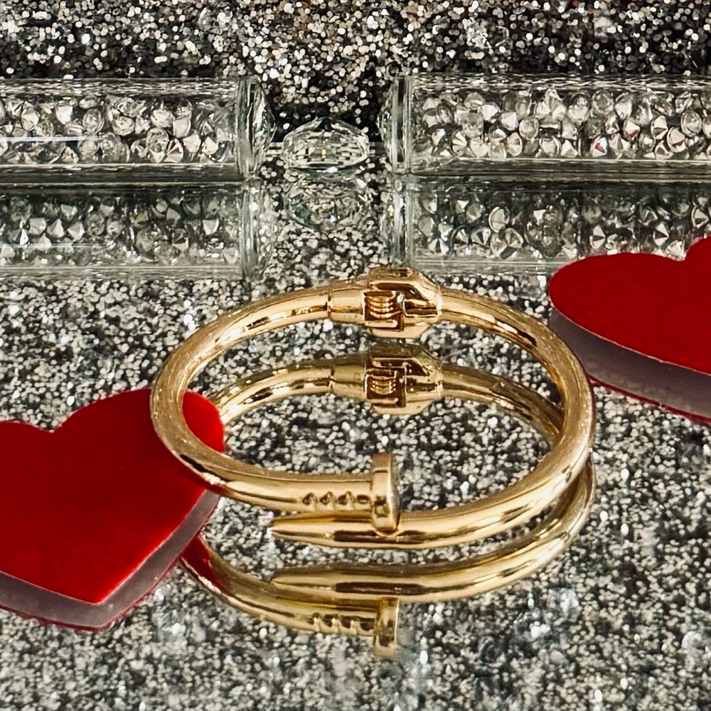 Gold plated nail design with  2 1/2 inch sized bangle with open easy clasp .